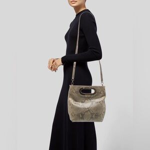 Michael Kors snakeskin cowboy bag with magnetic closure
